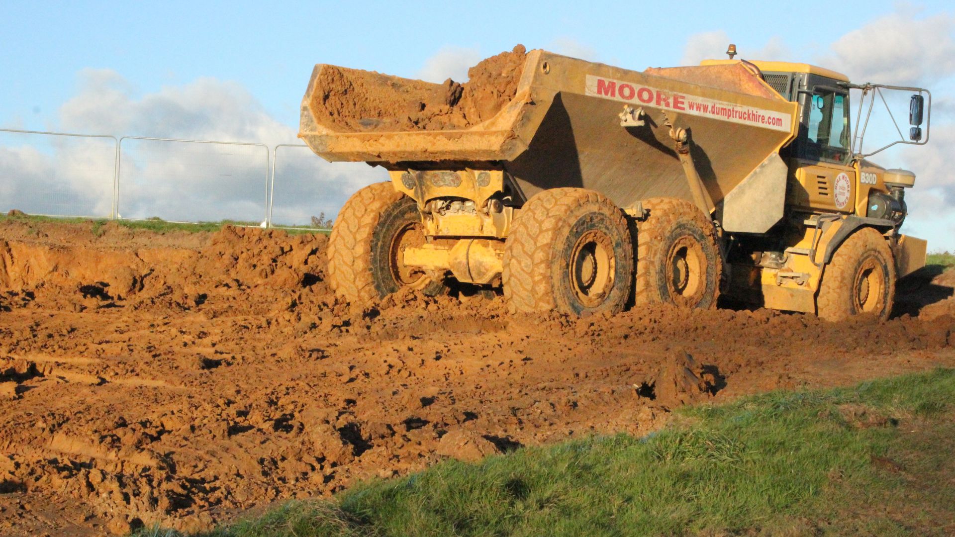 Dumper truck transporting excavated ground